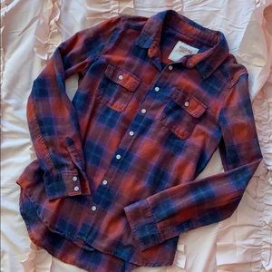 burnt orange and blue flannel